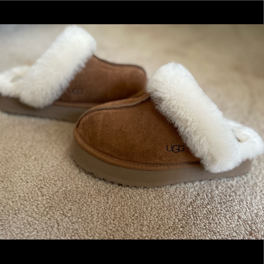 UGG platform slippers. Barely worn because they are too big.